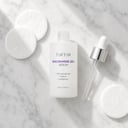 Tirtir Niacinamide 20% Serum on surface with dropper