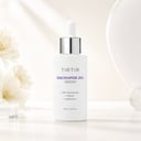 Tirtir Niacinamide 20% Serum on vanity with brightening routine
