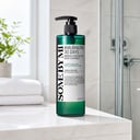 Some By Mi Acne Body Cleanser on vanity with body care routine