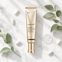 Medicube Deep Lifting Peptide Eye Cream on surface with collagen capsules
