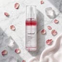 Medicube PDRN Pink Glutathione Serum Mist with rose petals on surface