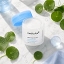 Medicube Zero Pore Pad Mild jar with pads on clean surface