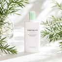 Skin1004 Tea-Trica Soothing Sun Milk on vanity with acne-safe sun routine