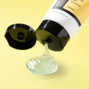 Cosrx Snail Mucin Gel Cleanser on surface with foam texture
