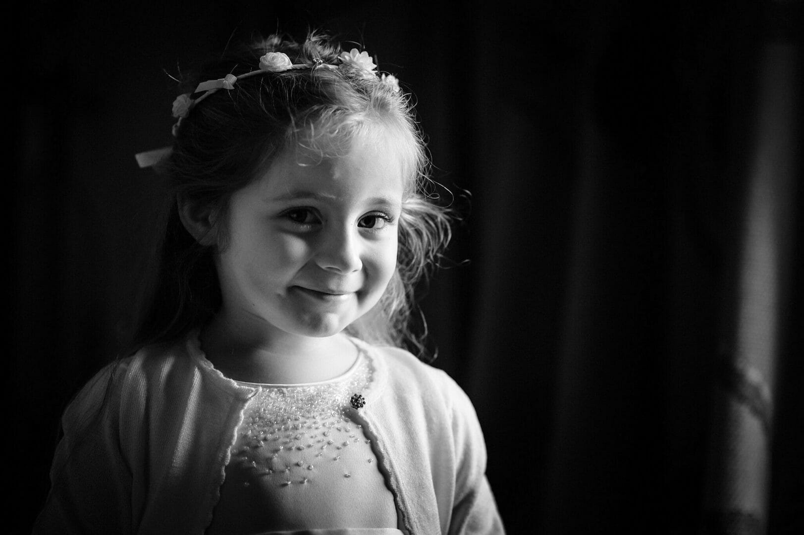 Cute flowergirl at Larmertree gardens in wiltshire