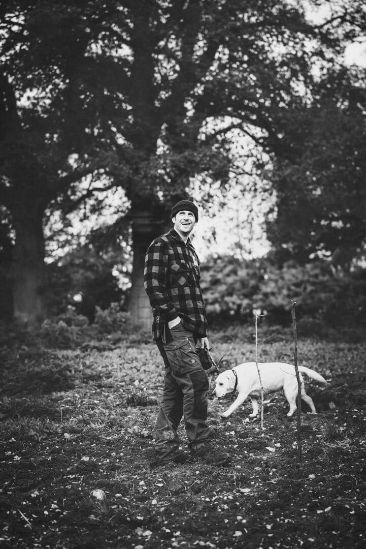 John poses with PTSD dog