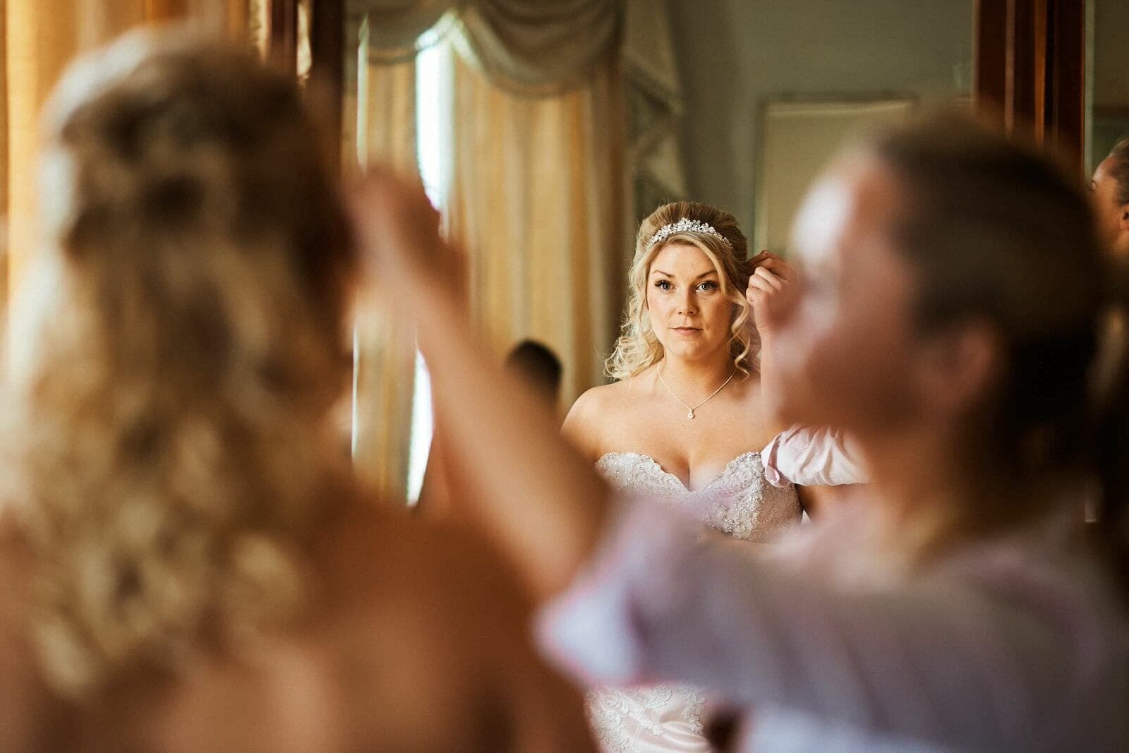 bride in mirror - North Cadbury Court Wedding photographer