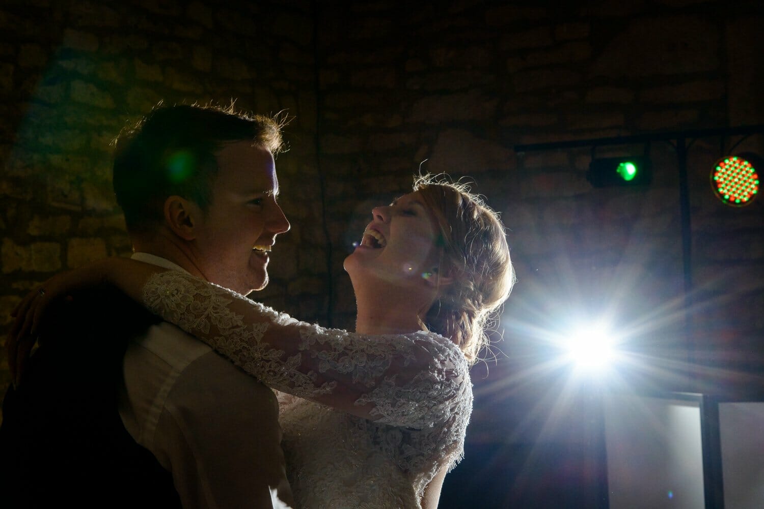 Bride laughing at Brympton House wedding