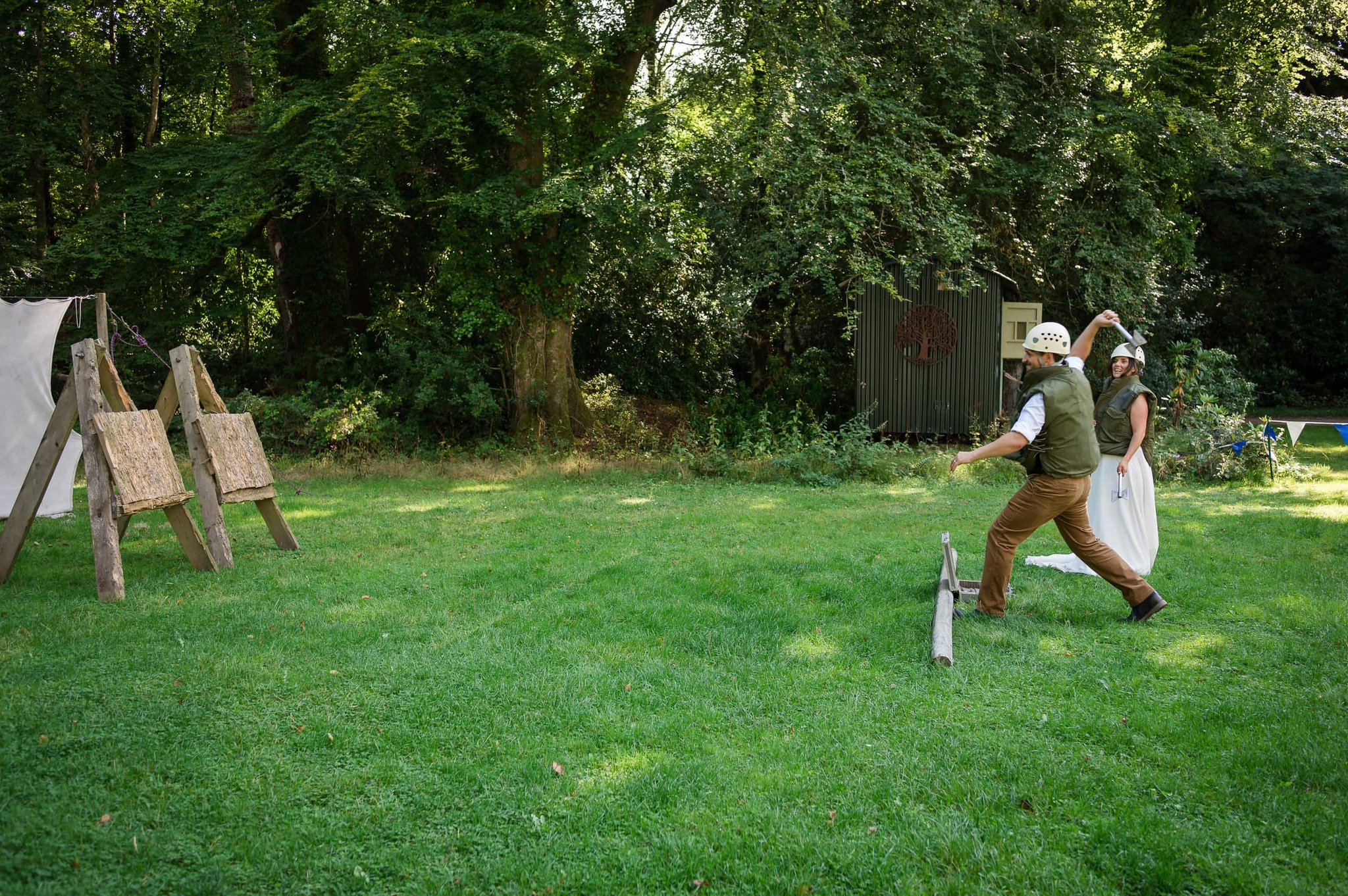 Bride and groom axe throwing