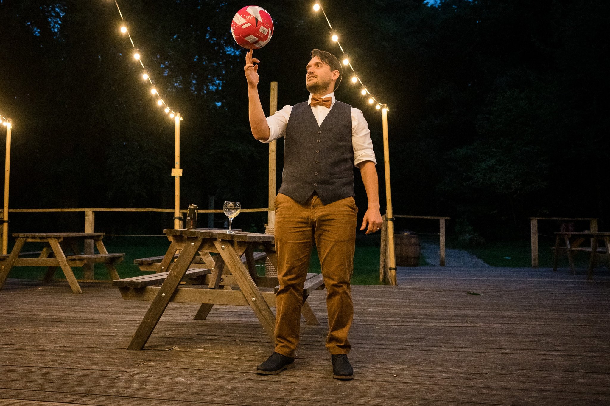 Groom spins football on finger