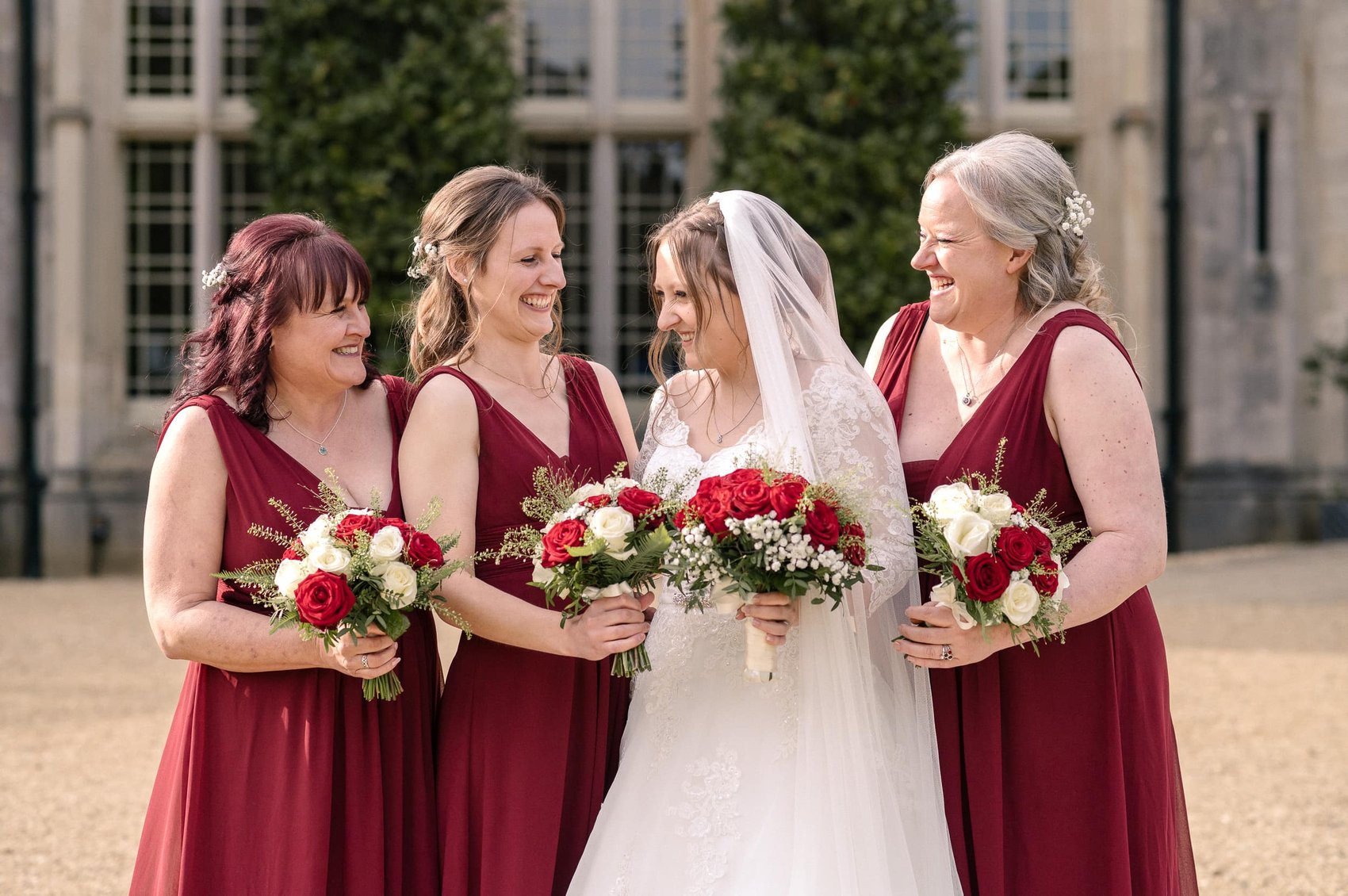 Bridemaids laughter at Highcliffe castle wedding