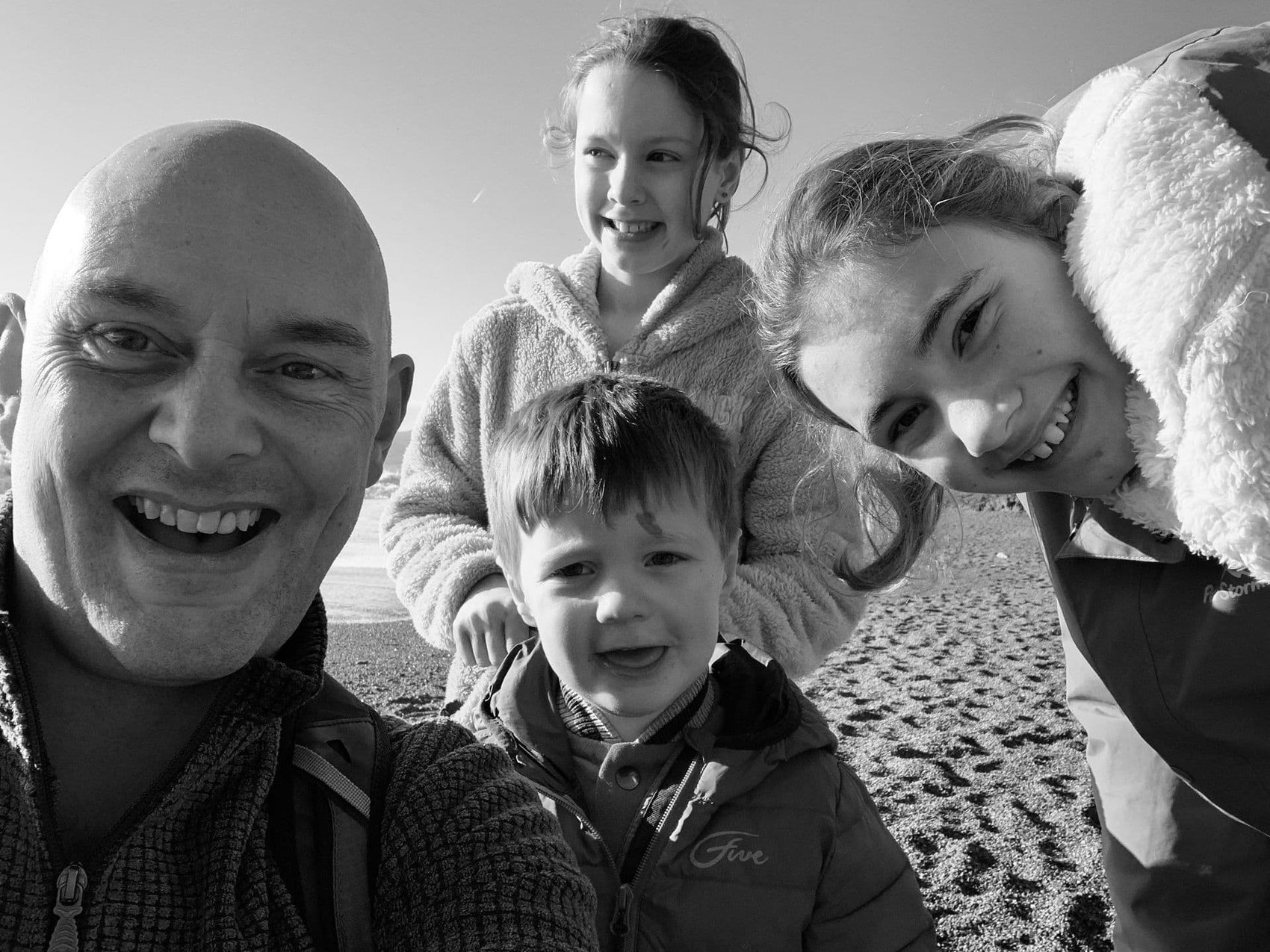 Family selfie on beach
