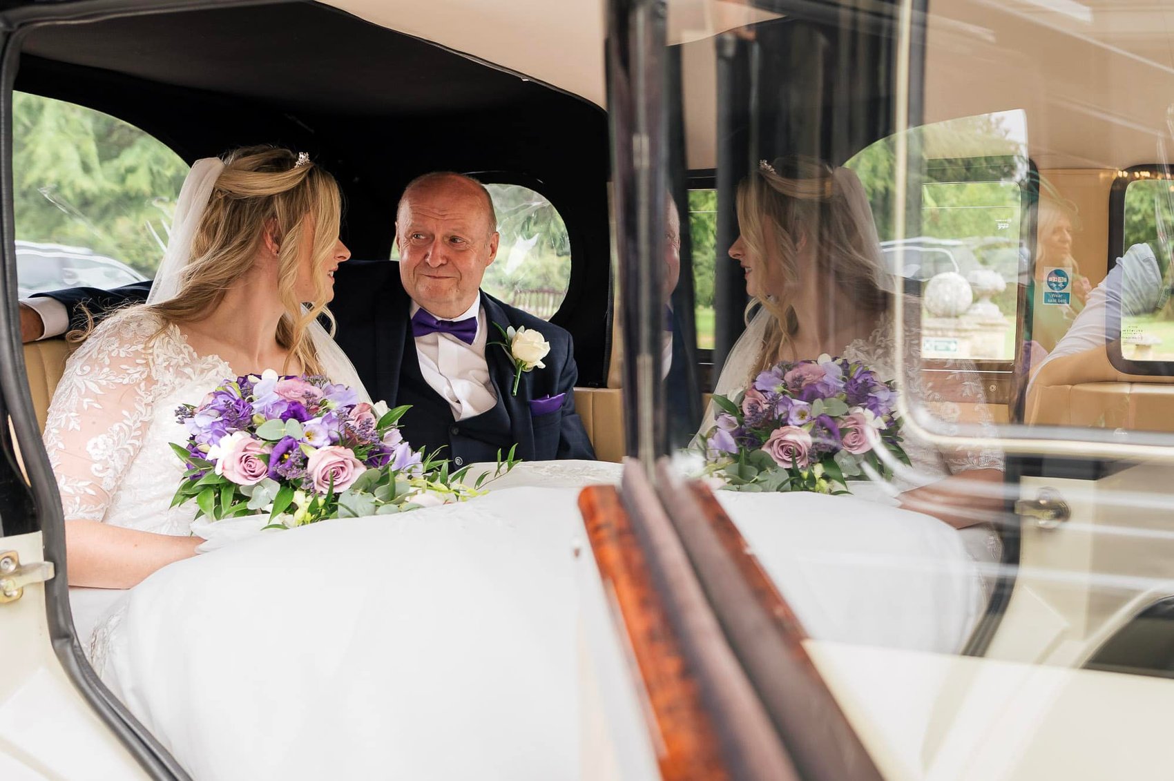bride and dad arrive at Chilworth Manor Hotel wedding