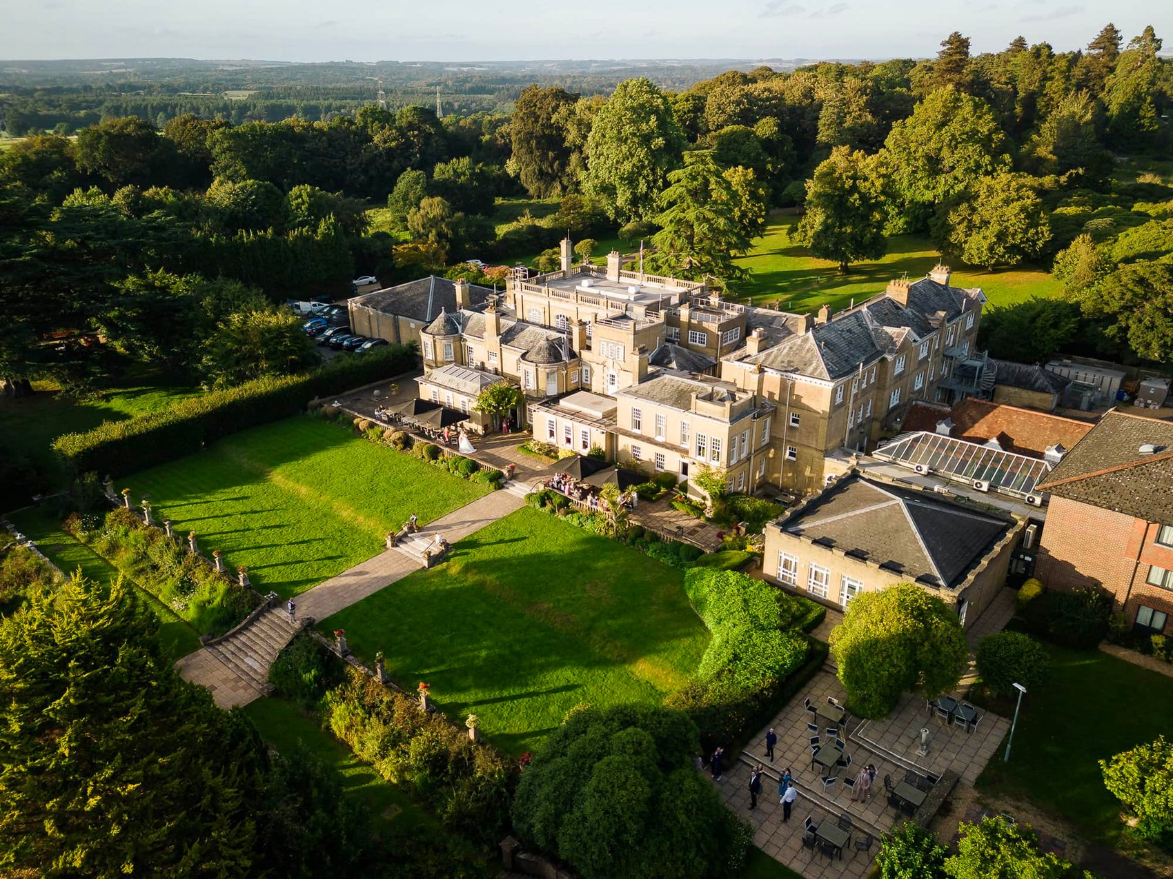 Chilworth Manor Hotel from the air in evening light