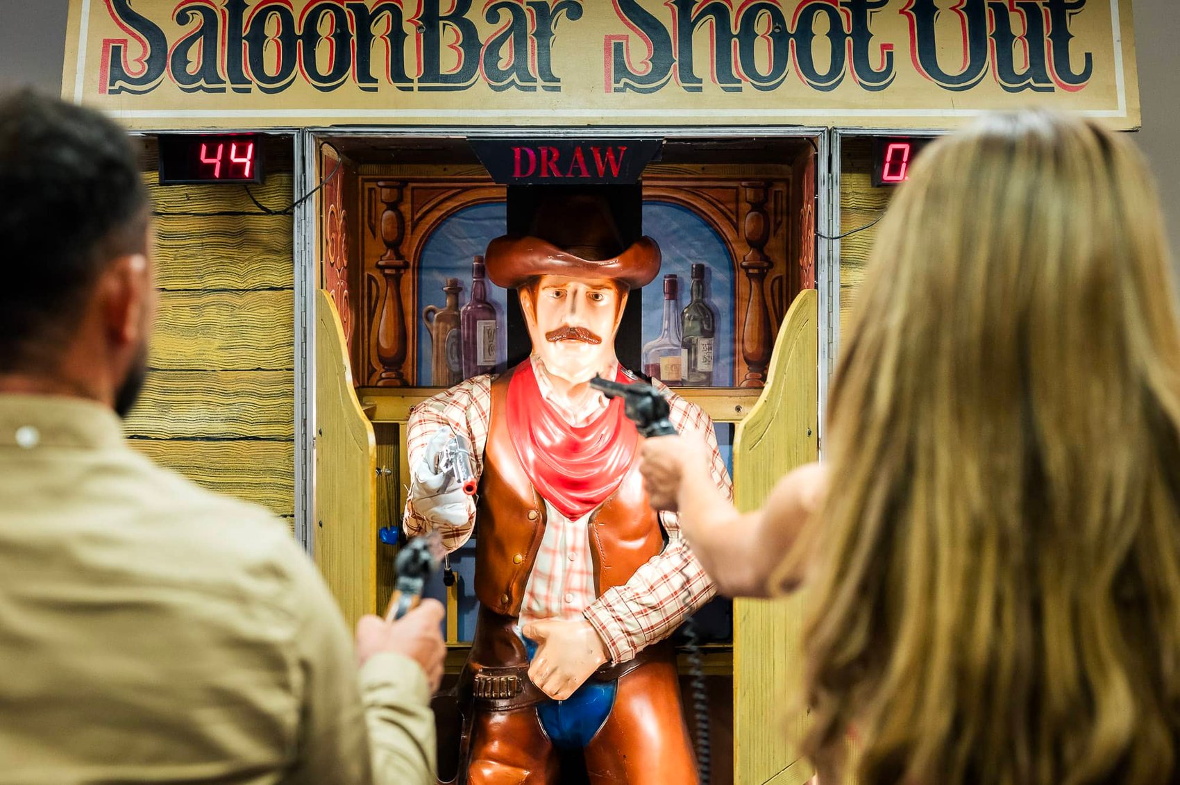 Saloon bar shooting arcade game at wedding