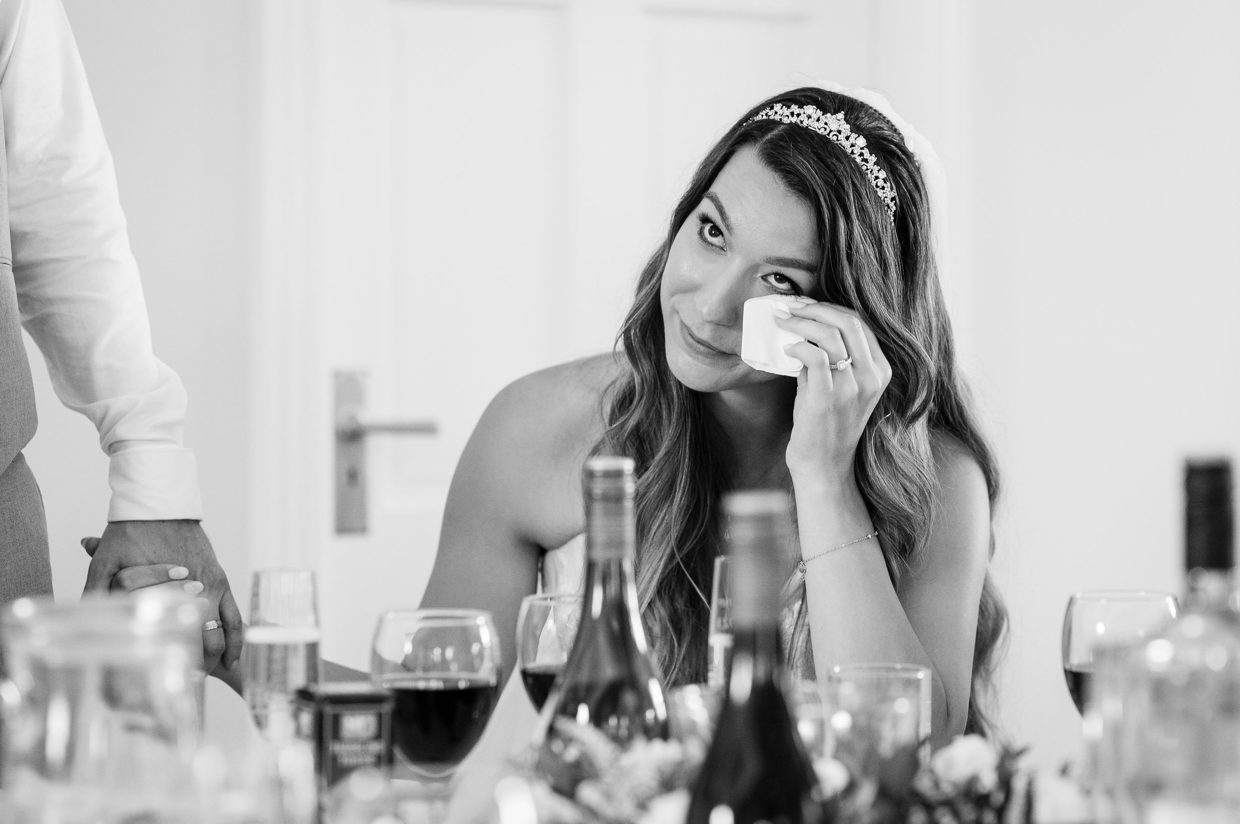 Brides emotional reaction to the grooms speech