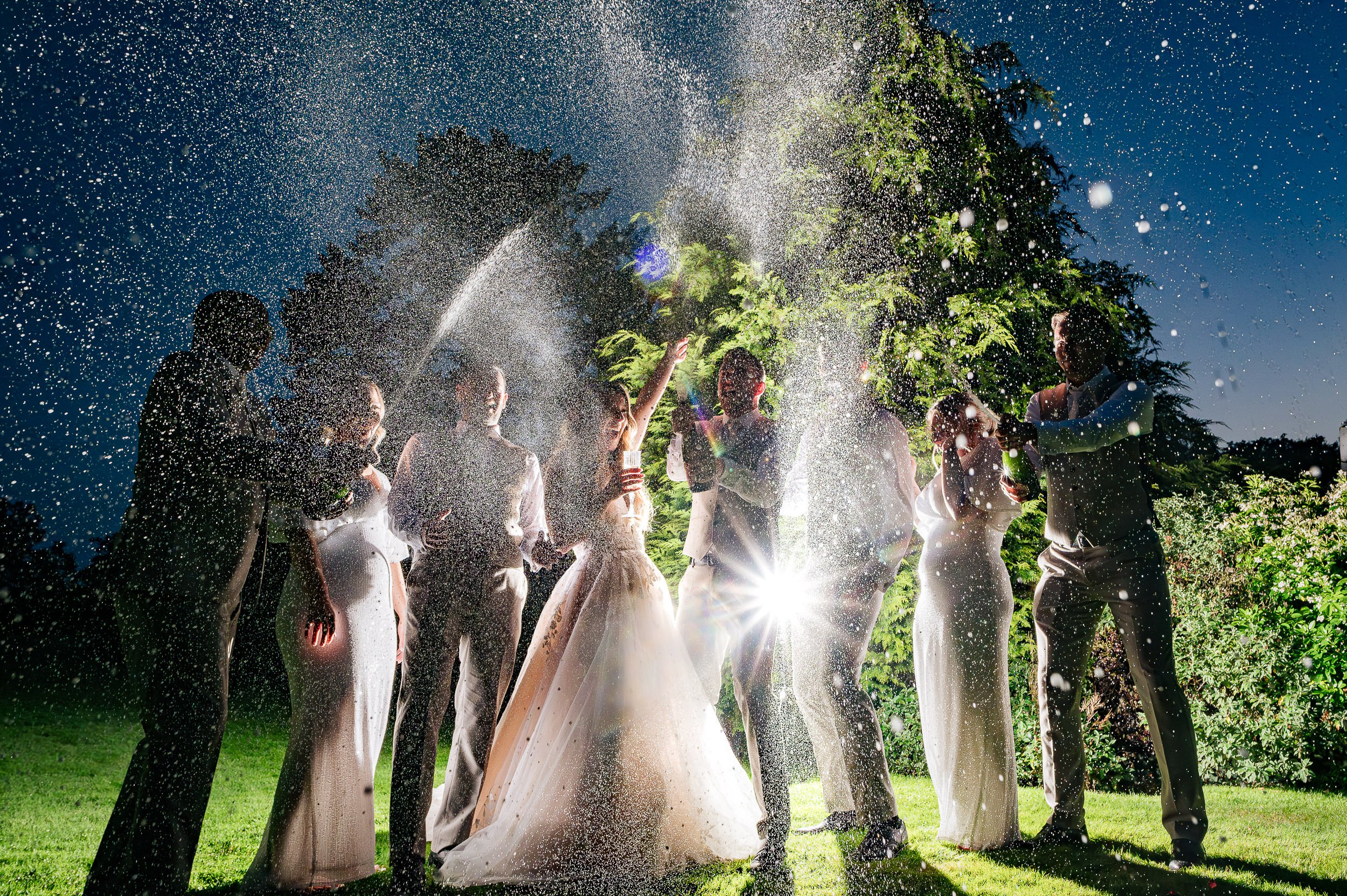 Bride tribe open Champagne F1 style at Hethfelton House wedding