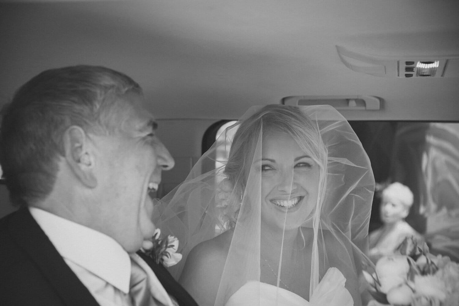 Bride arrives at Milton Abbey wedding Grounds