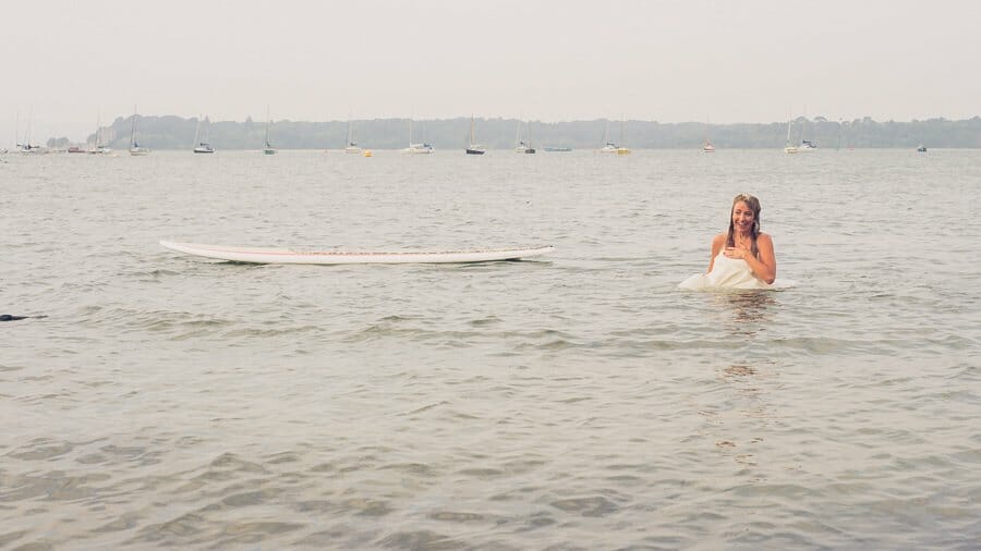 Bride jumping into water
