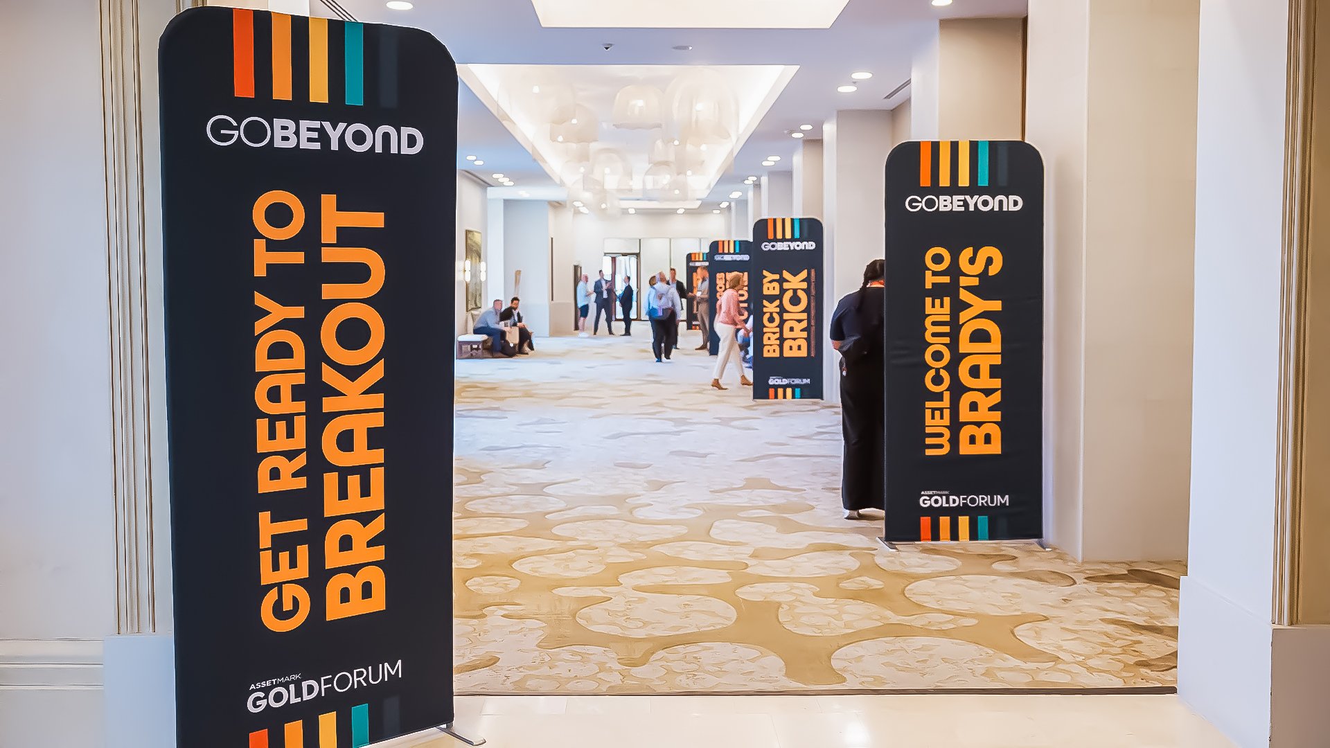 Audience inside a branded live event environment