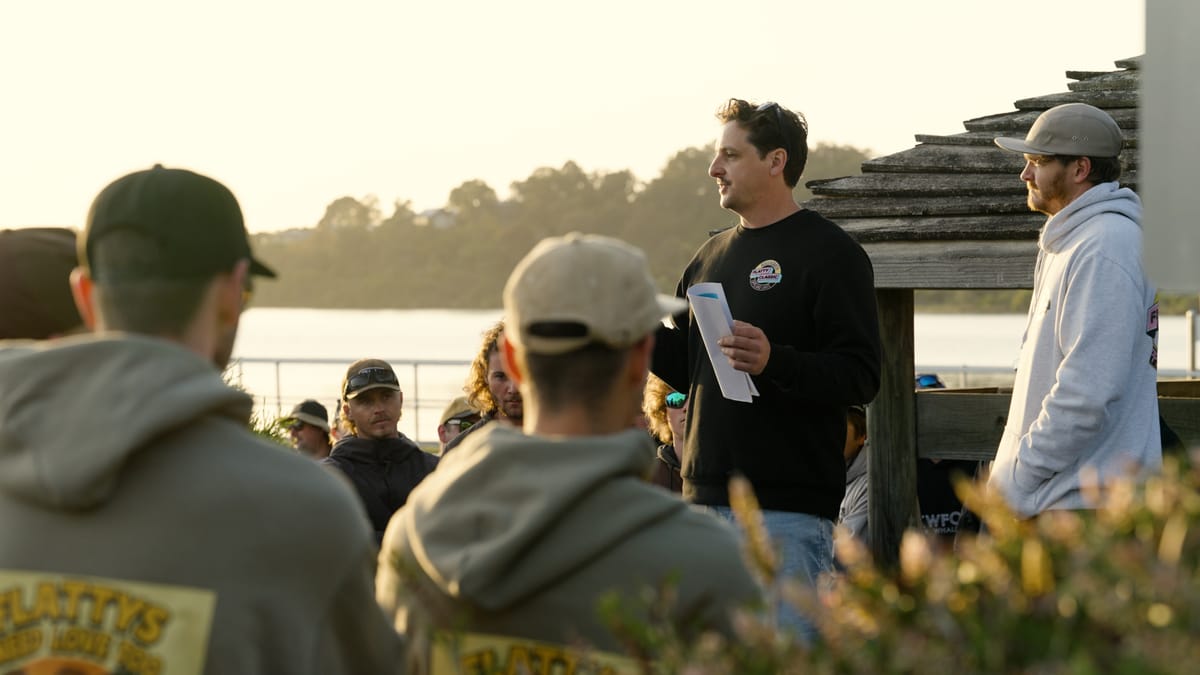 The briefing read out at golden hour, notes in hand