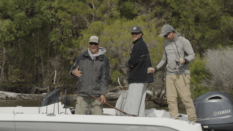 Anglers laughing on the boat during the Mallacoota Flatty Classic