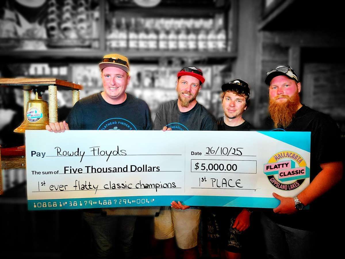 The Rowdy Floyd's crew with the $5,000 first-place cheque and the Flatty Classic bell