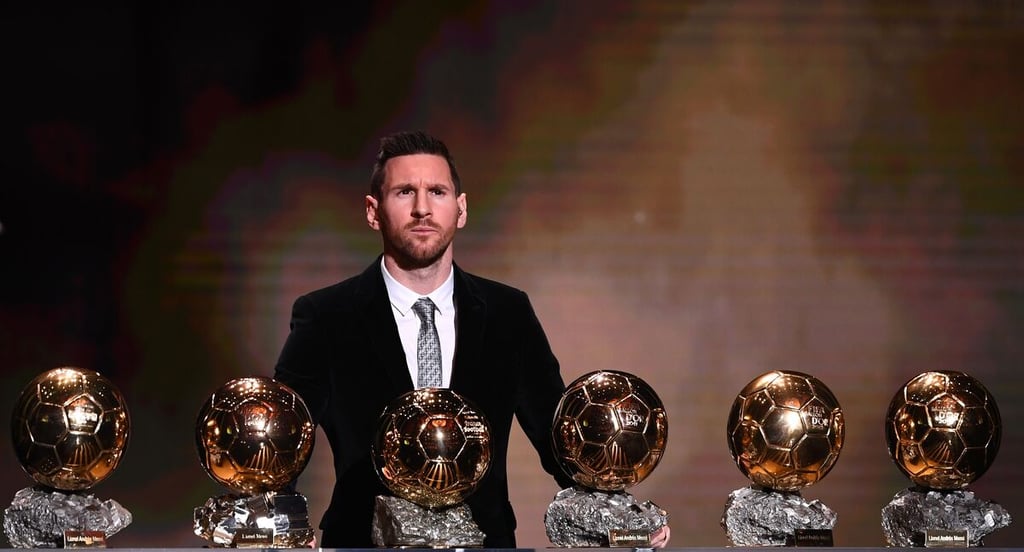 Lionel Messi con i Palloni d'oro