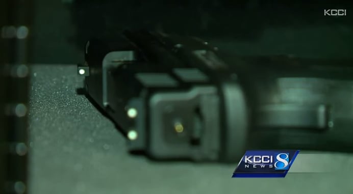 Young woman pulls handgun on would-be robber while working