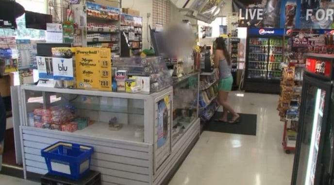 [VIDEO] Robber Enters Store, Points Gun At Clerk, Owner Points Own Gun At Robber, Robber Loses