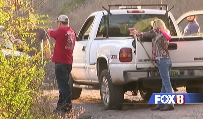 Caught On Camera: Family Holds Christmas Gift Thieves At Gunpoint During TV Interview