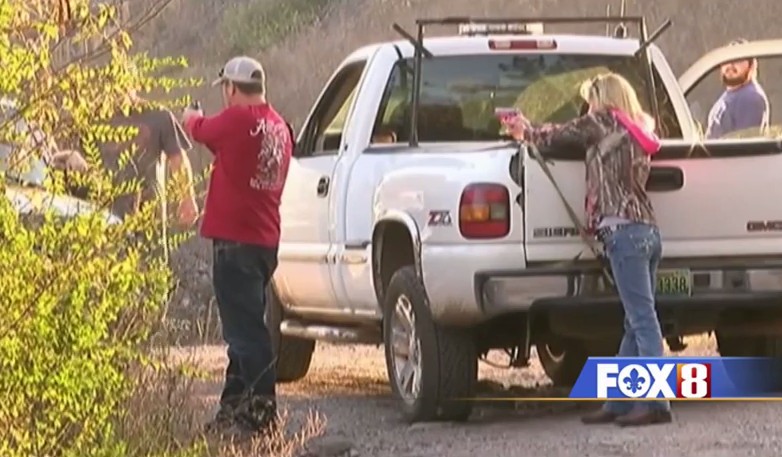 Caught On Camera: Family Holds Christmas Gift Thieves At Gunpoint During TV Interview