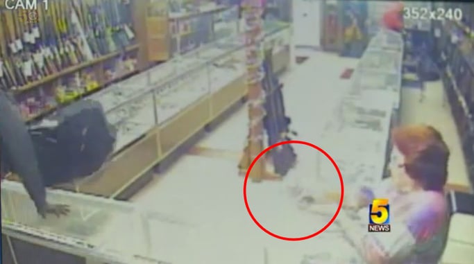 [VIDEO] Pawn Shop Employee Returns Fire On Armed Robbers, Incident Caught On Camera