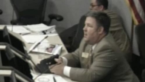 CAUGHT ON CAMERA: City Council Meeting Interrupted By Gunfire, Council Member Draws Firearm