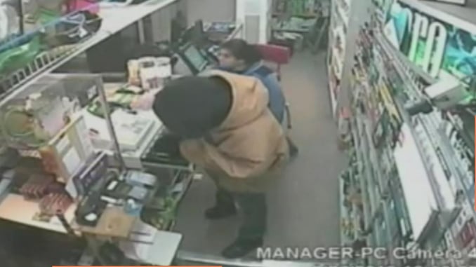 [VIDEO] Clerk Grabs Gun From Robber, Fights And Shoots