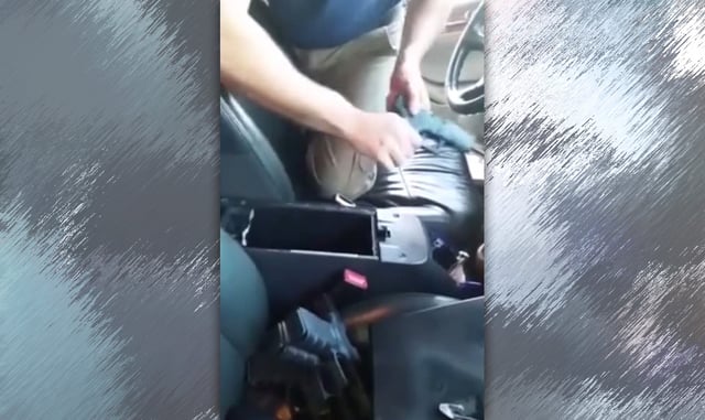[VIDEO] Cop Searches Smuggler’s Car – Finds Ridiculous Number Of Guns