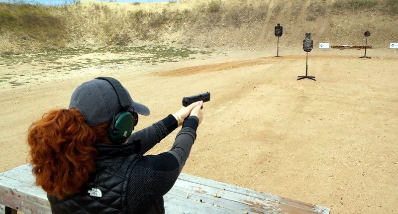 Screenshot from Texas Firearms Festival - Christen tests out the HK P30SK VP9 and FNH FNS9C FNS9