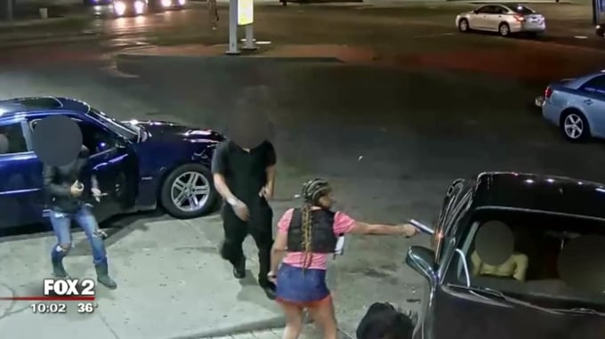 [VIDEO] Female Thug Opens Fire On People At Detroit Gas Station