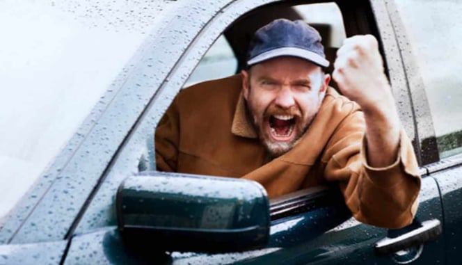 You’re Driving Along When Another Vehicle’s Occupants Start Pointing Guns At You: What To Do?