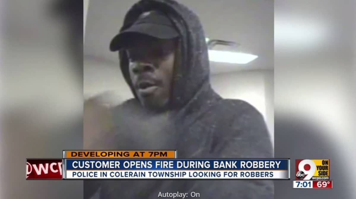 Bank Robber And Customer Exchange Gunfire