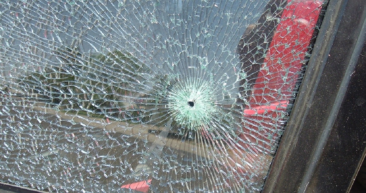 Man at Drive-Thru Blasts Through Window to Robbery Suspect