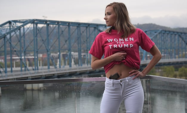 College Student Poses With Firearm For Graduation Photo, Sets The Internet On Fire