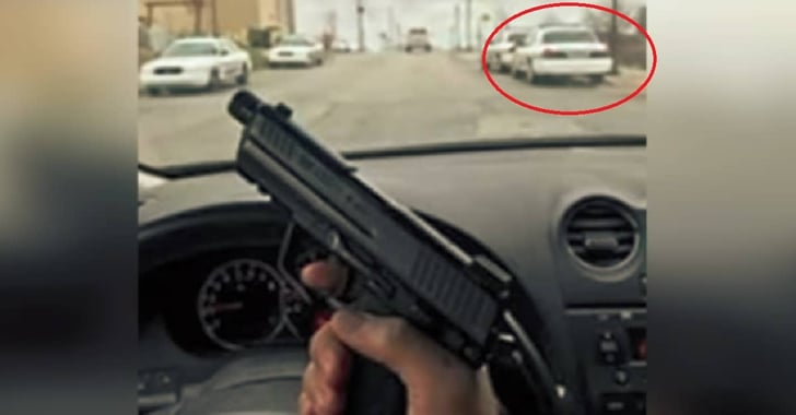 Man Posing With Guns By Police Cars Caught, Charged
