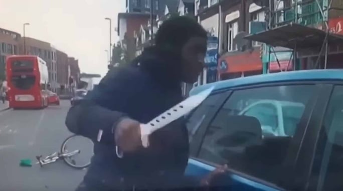 Why We Carry: Cyclist Almost Hit By Vehicle Goes On Knife Rampage In The Middle Of The Street *WATCH*