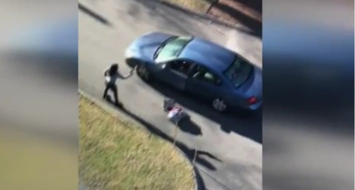 [WATCH] Woman Takes Gun From Man Inside Vehicle During Heated Exchange, Fires Shot, Both Arrested
