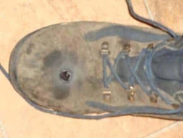 GRAPHIC: Man Decides To Test His Steel Toed Boots With A .45