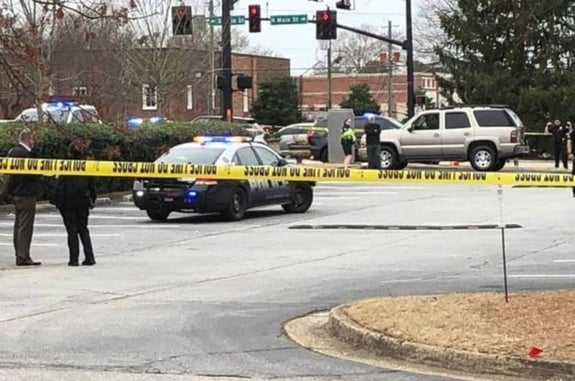Armed Citizen Holds Suspect At Gunpoint, Who Had Just Shot And Killed A Woman Outside Bank