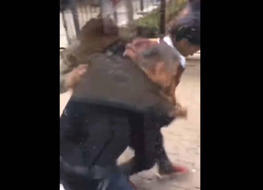 [VIDEO] Security Guard Gets Jumped By Two Guys, Onlookers Don’t Care Until The Guard Draws His Gun