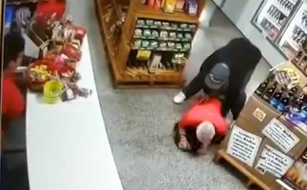 [WATCH] Armed Robber Walks Into Shop Filled With Armed Employees, Then Shot In The Back By The Owner’s Armed Wife
