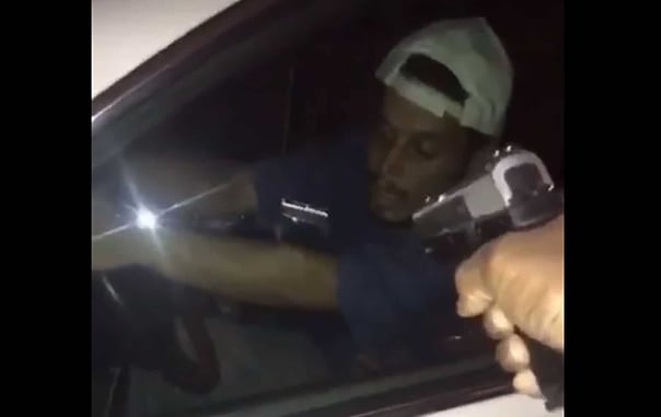 Watch This Homeowner Hold This Car Thief At Gunpoint Until Police Arrive